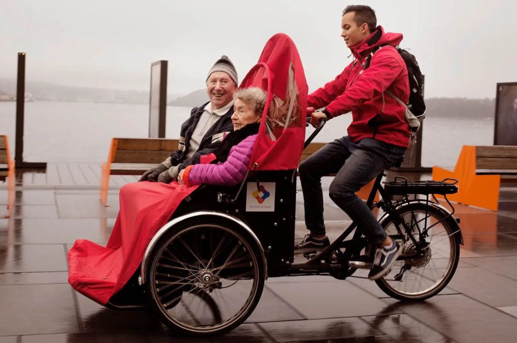 Transporte en bicicletas y triciclos de personas con discapacidad